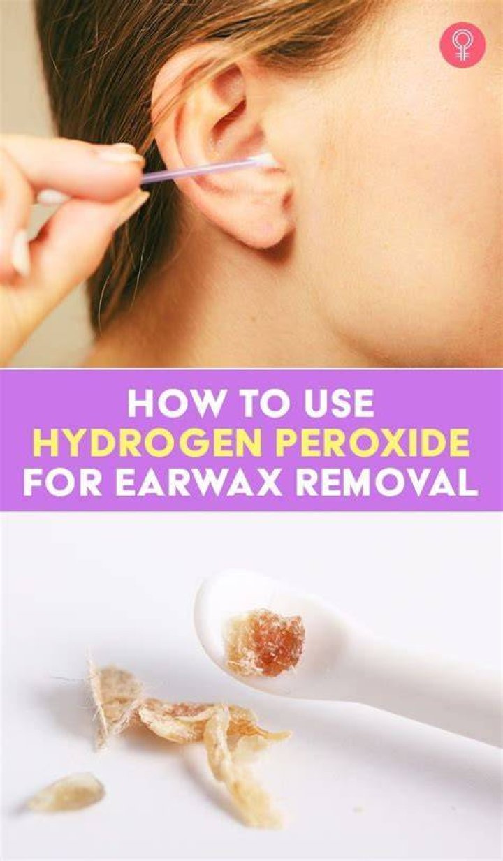 How does hydrogen peroxide remove impacted ear wax?