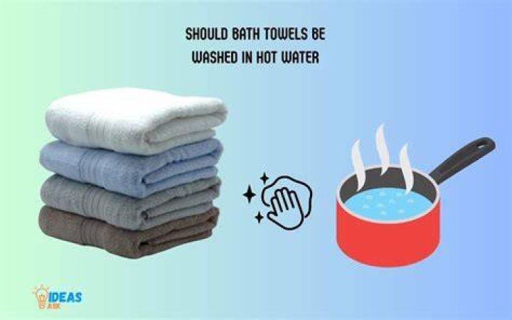 Should towels be washed in hot or warm water?